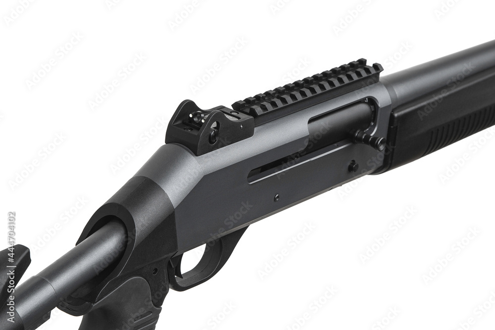 Close-up part of a modern semi-automatic shotgun. Weapons for sports and hunting. Black weapon isolate on white back