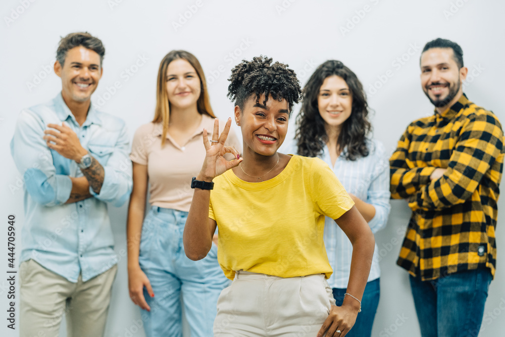 Portrait of office worker smiling to camera in big and creative office in business meeting Portrait of office worker smiling to camera in big and creative office in business meeting