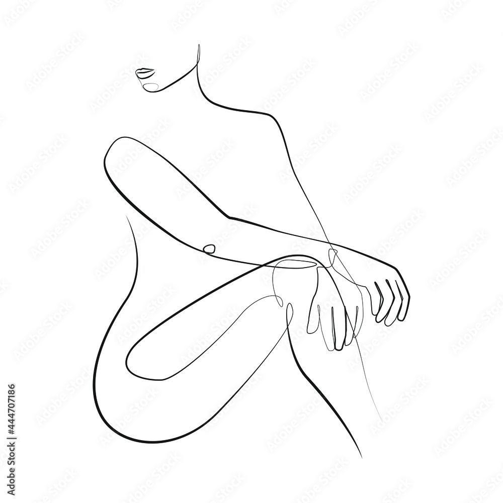 Woman sits on the floor with her hands crossed on her knee and her head ...