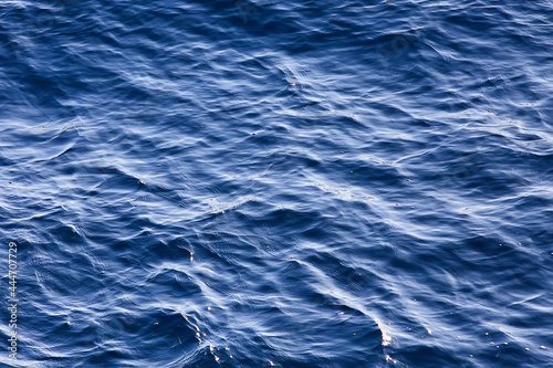 summer sun sea texture glare on the water, abstract ocean aqua background