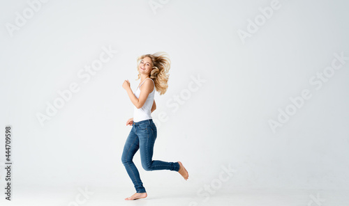 woman in jeans movement dance energy positive fashion