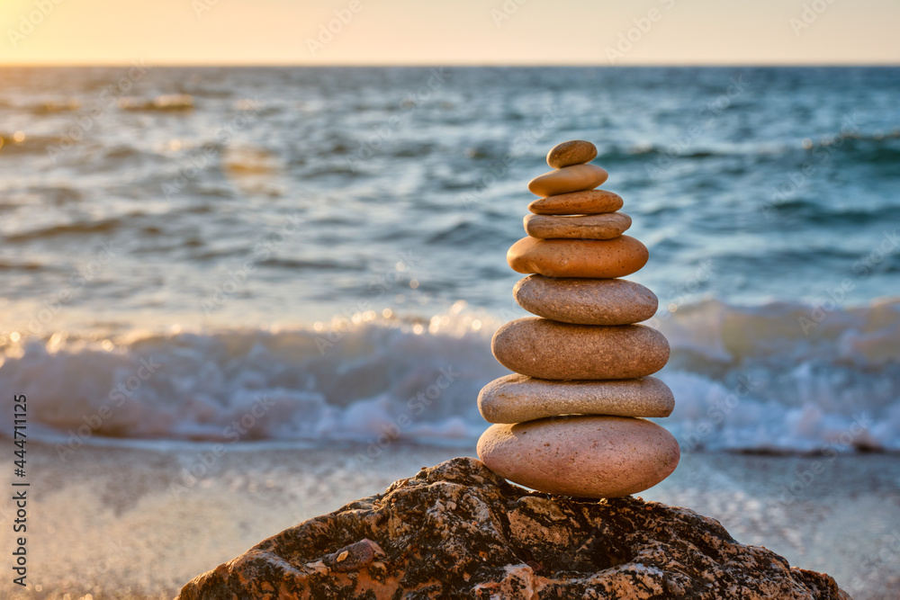 Fototapeta premium Concept of balance and harmony - stone stack on the beach