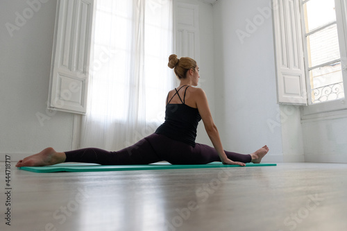 Woman standing in yoga position