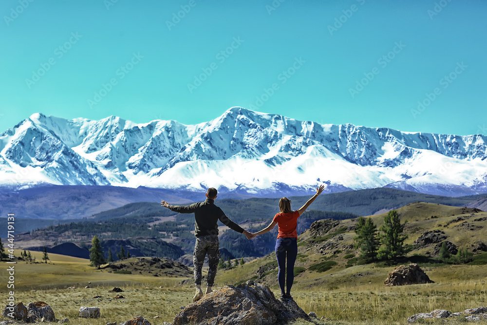 couple hands up mountains, landscape adventure active view