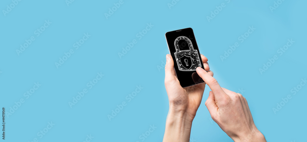 Male hand holding a lock padlock icon.Cyber security network. Internet technology networking.Protecting data personal information on tablet. Data protection privacy concept. GDPR. EU.Banner Male hand holding a lock padlock icon.Cyber security network. Internet technology networking.Protecting data personal information on tablet. Data protection privacy concept. GDPR. EU.Banner