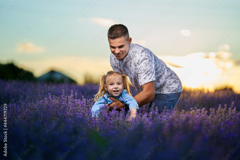 Father and daughter in the lavender field Father and daughter in the lavender field