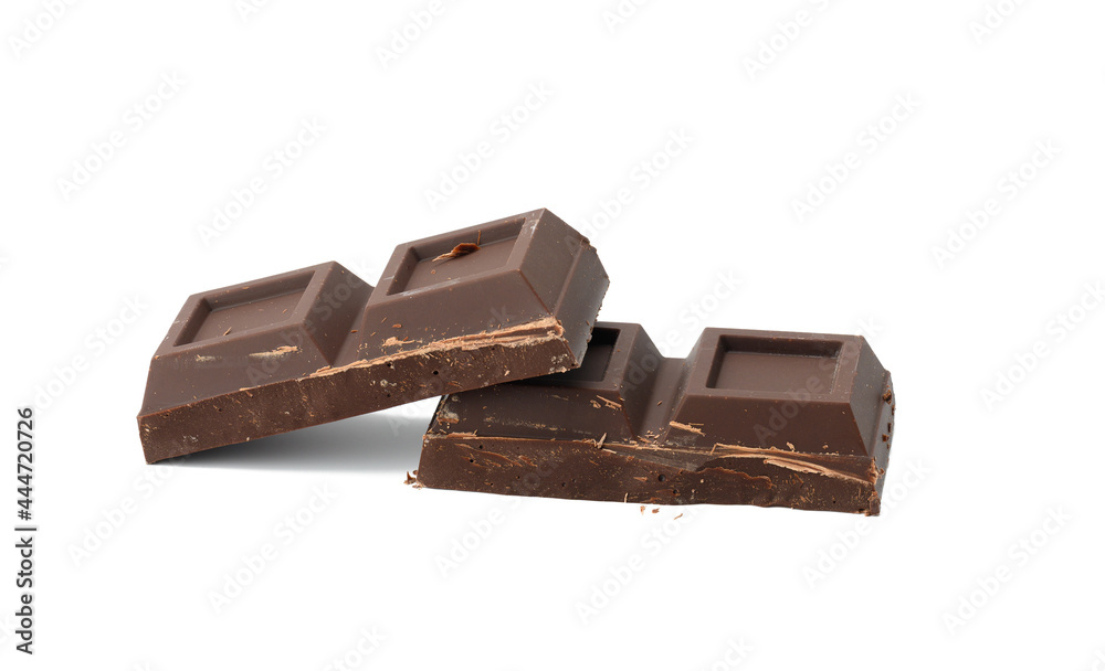 broken black chocolate with pieces isolated on white background. broken black chocolate with pieces isolated on white background.