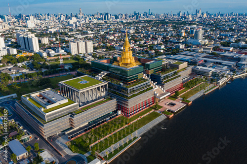 Aerial view of Bangkok skyline and skyscraper with new Thai parliament, Sappaya Sapasathan (The Parliament of Thailand).National Assembly with a golden pagoda on the Chao Phraya River in Bangkok. 4k 