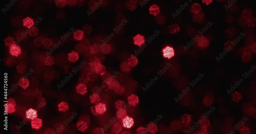 Flashing and rotating multi-colored star-shaped bokeh. Abstract colorful background. Beautiful abstract background of bokeh. Flashing and rotating multi-colored star-shaped bokeh. Abstract colorful background. Beautiful abstract background of bokeh.