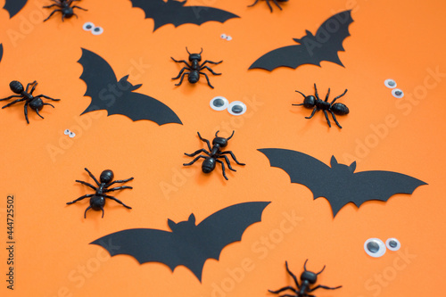 Halloween pattern black decorations orange background © aprilante