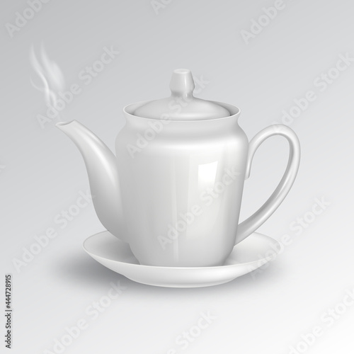 Teapot with tea on a saucer