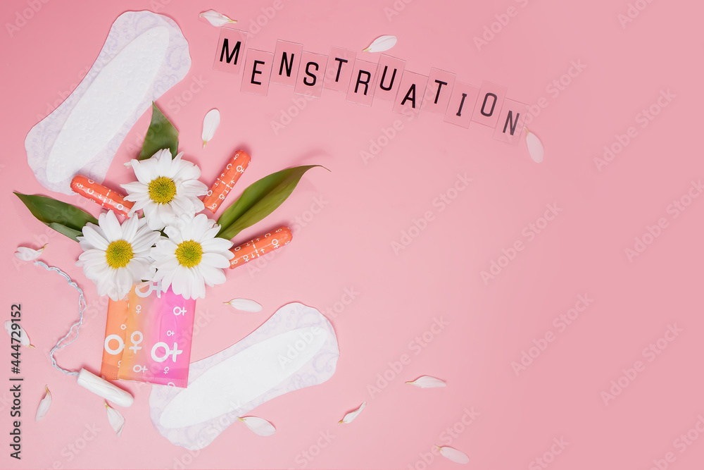 Womans comfort and hygienic protection, menstruation, sanitary pads on pink background. Critical days