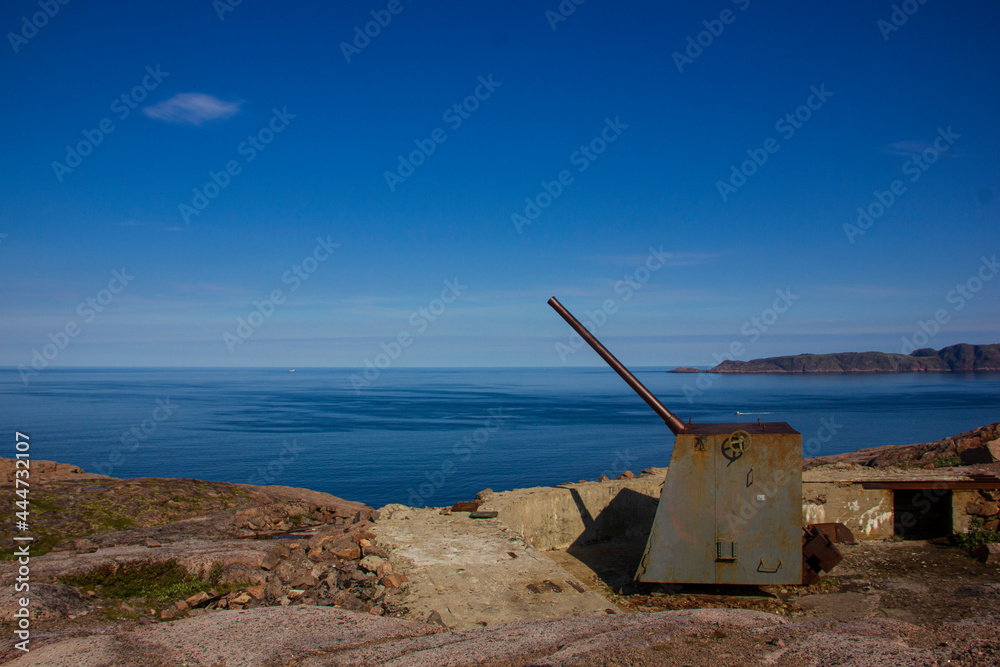 Abandoned coastal artillery battery. Landscapes of the Murmansk region, Teriberka, Russia.
