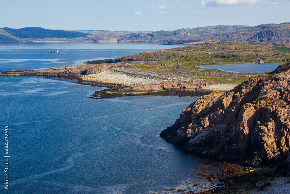 Fototapeta premium Landscapes of the Murmansk region. Road to and from the fortification of the coastal defense battery, Teriberka, Russia.