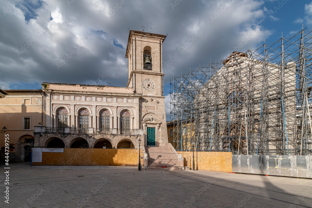The facade of the Palazzo comunale in Norcia, Perugia, Italy, next to