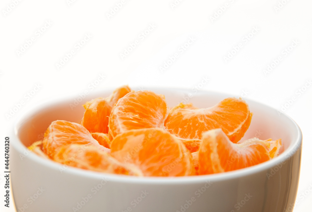 Tangerine in a white bowl Tangerine in a white bowl