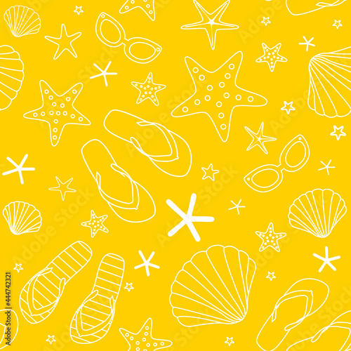 summer beach pattern with flip-flops, shells , sunglasses and starfish on the sand