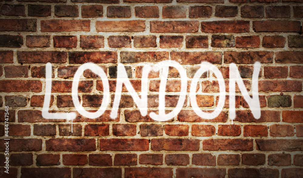 London, England, UK, GB spray painted inscription on the brick wall London, England, UK, GB spray painted inscription on the brick wall