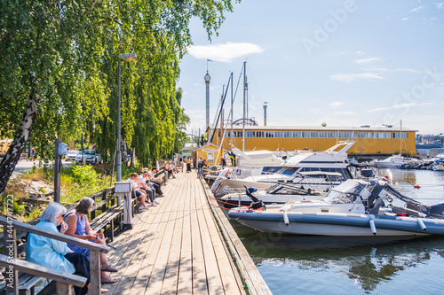 Photography Stockholm Sweden - July 4 2021: Relaxing atmosphere in the port of Djurgarden