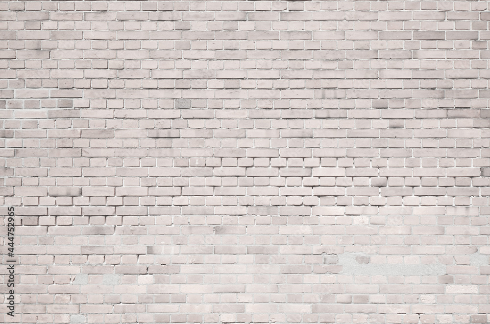 White old brick wall with traces of mortar repair. Retro brickwall texture background White old brick wall with traces of mortar repair. Retro brickwall texture background