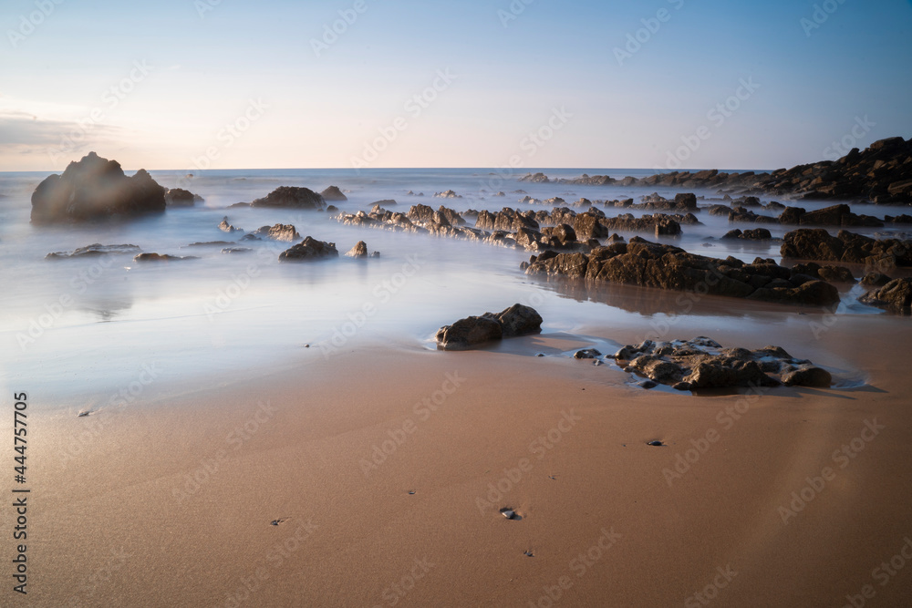 rocky beach at sunset 