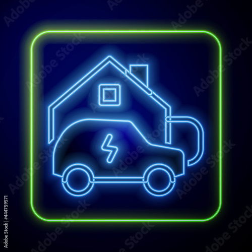 Glowing neon Electric car parking charging at home wall box charger station on house icon isolated on blue background. Vector