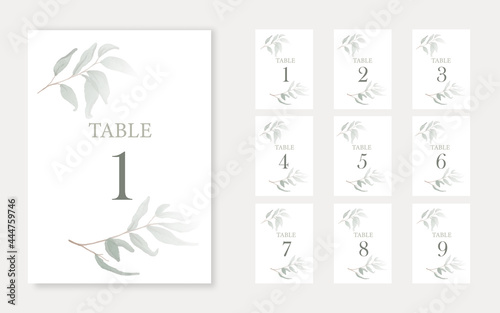 Wedding table number template with watercolor green leaves.