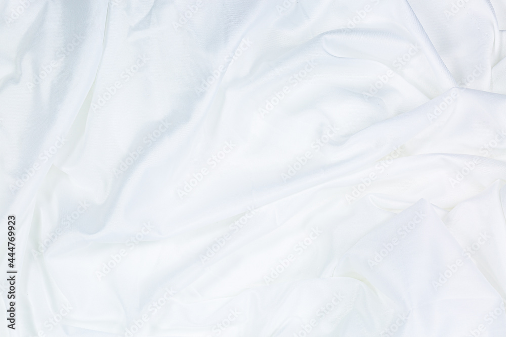 White cloth background abstract with soft waves,Closeup elegant crumpled of white silk fabric cloth background and texture. Luxury background design.