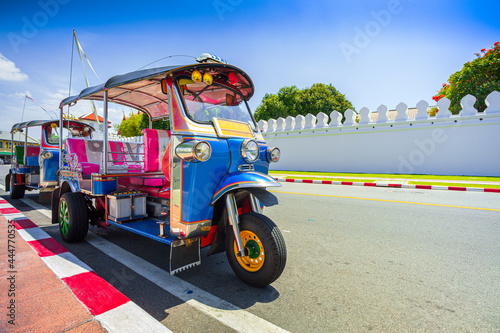 Blue Tuk Tuk, Thai traditional taxi in Bangkok Thailand,Bangkok traffic in front of Giant Swing  © banjongseal324
