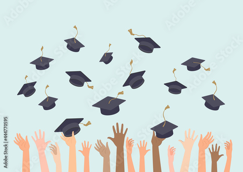 People hands throwing graduation hats in the air. Graduating students. photo