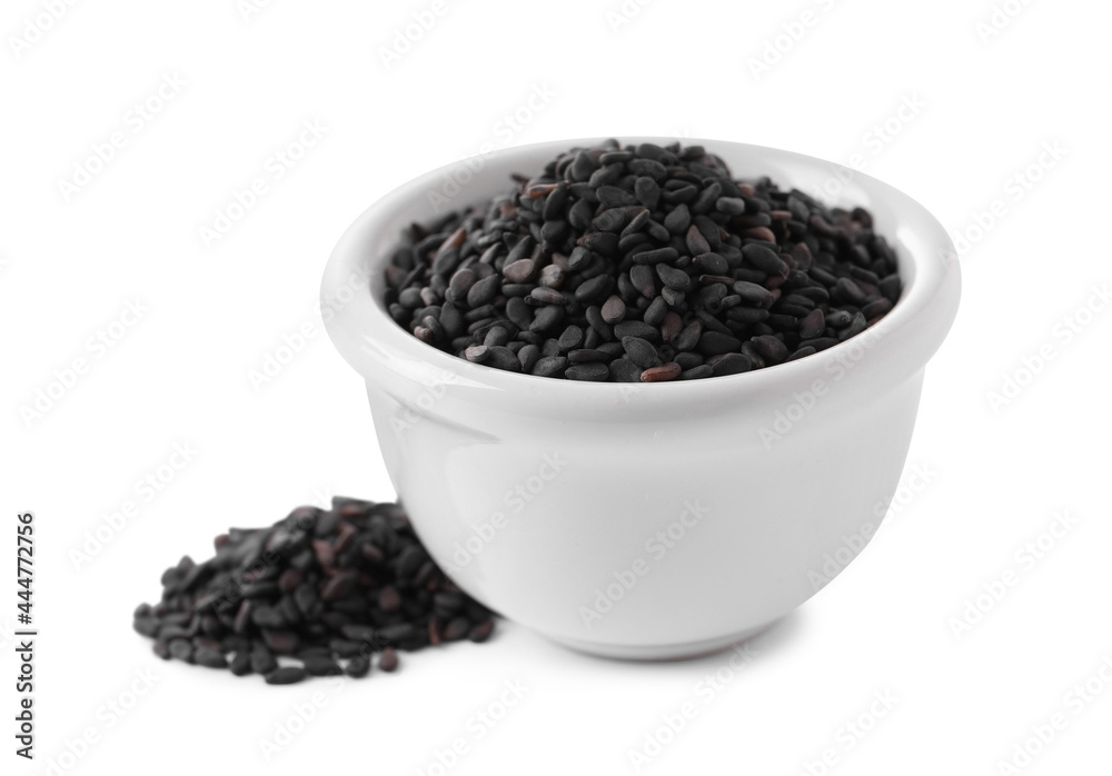 Raw black sesame seeds with bowl on white background Raw black sesame seeds with bowl on white background