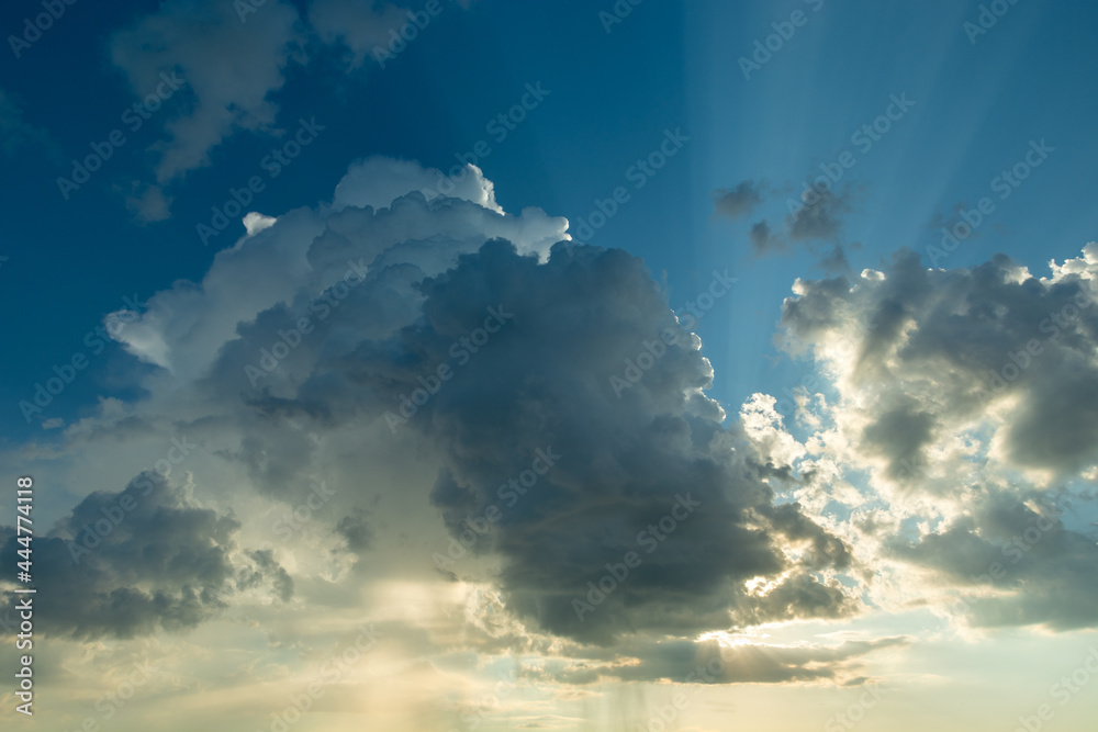 A landscape of clouds backlit by the sun A landscape of clouds backlit by the sun