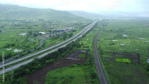 Pune, India -  July 11 2021: Aerial footage of the Mumbai-Pune Expressway during the monsoon season near Pune India. The Expressway is officially called the Yashvantrao Chavan Expressway. photo