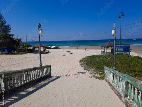 Colva beach in goa  tropical beach  blue water and blue sky Arabian sea beach in India  white sand and blue water  view of the beach.