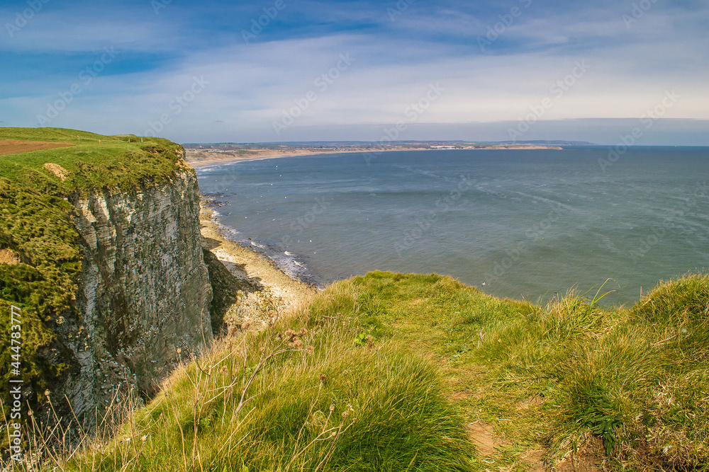 View of Filey Bay from the top of Buckton Cliffs on the North Yorkshire Coast. This place is on the Headland Way footpath.