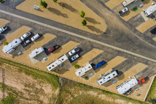 Aerial view of RV campground with travel trailer parking camping park