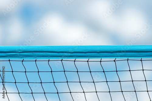 Beach volleyball and beach tennis net on sky background. Summer sport concept © Augustas Cetkauskas