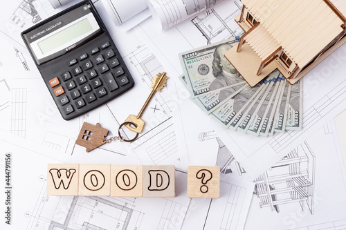 The cost of wood during construction, the price of designing a house made of wood