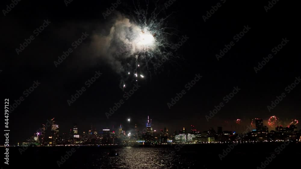 Fireworks celebration of July 4th with the famous Manhattan skyline Fireworks celebration of July 4th with the famous Manhattan skyline