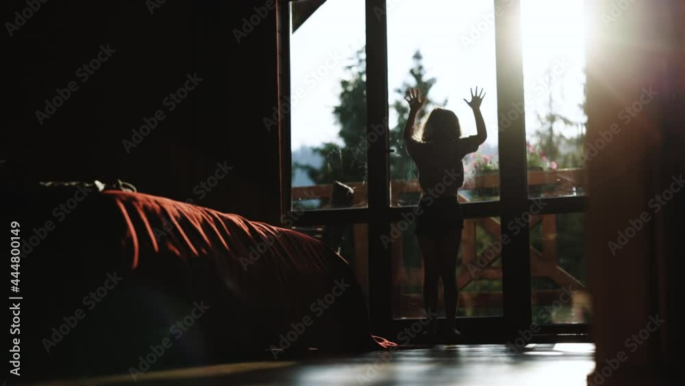 Social distancing. Bored child on home quarantine. Unhappy Girl in Quarantine Looking out the Window. Staying Home in Self-Quarantine. Allergy, covid-19 coronavirus pandemic, prevention epidemic