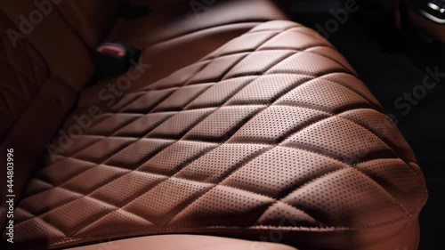 Brown leather interior of a luxury modern expensive car of the executive class S.