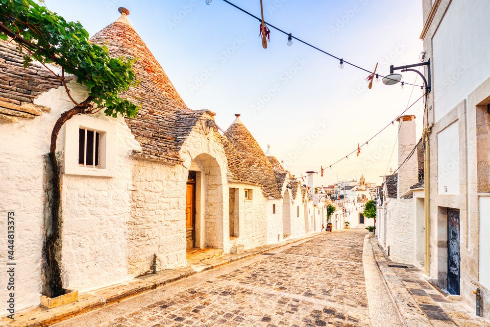 Famous Trulli Houses during a Sunny Day with Bright Blue Sky in Alberobello, Puglia
