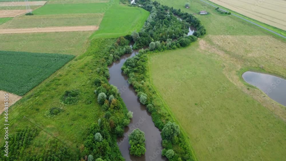 Renaturation of a small river - aerial tracking shot Renaturation of a small river - aerial tracking shot