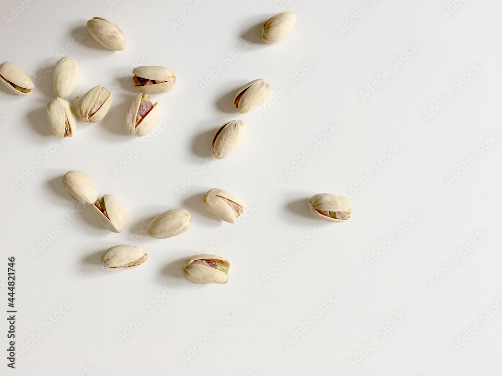 pistachio nuts close up white background