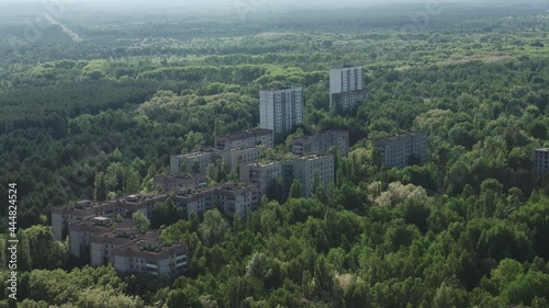 Aerial video abandoned buildings In Ghost Town Pripyat, Ukraine. Chernobyl Disaster Exclusion Zone. Summer
