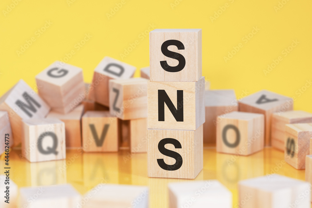 acronym SNS from wooden blocks with letters, concept acronym SNS from wooden blocks with letters, concept
