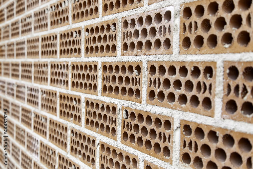 Brick wall with holes