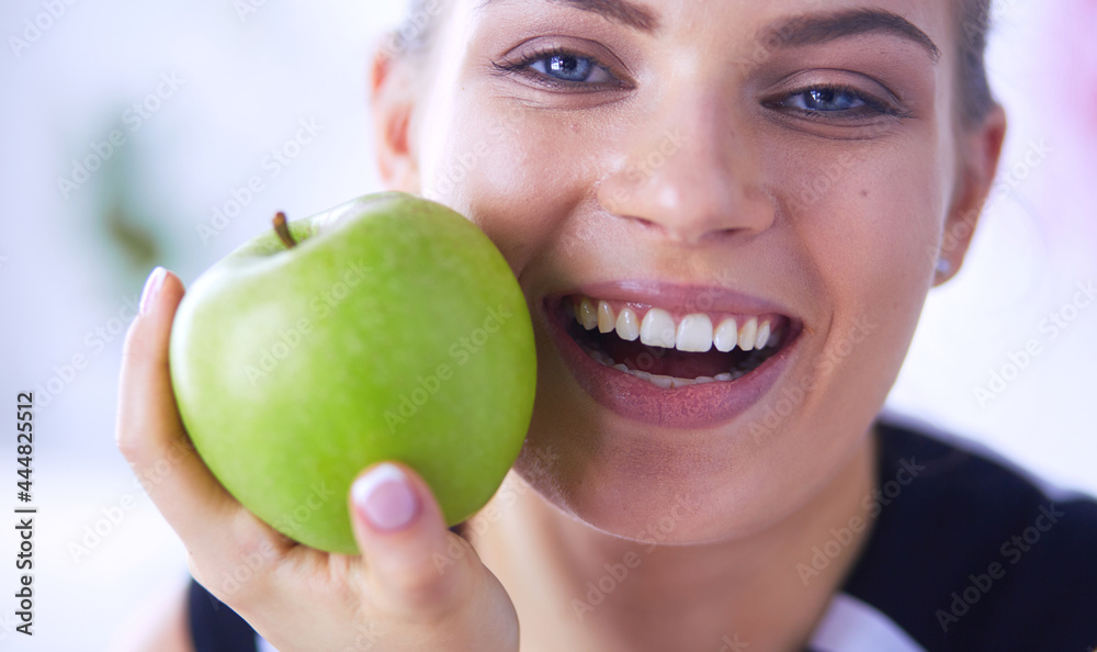 Close up portrait of healthy smiling woman with green apple. Close up portrait of healthy smiling woman with green apple.