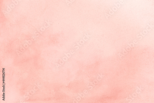 Pale pink peach color plastered textured background