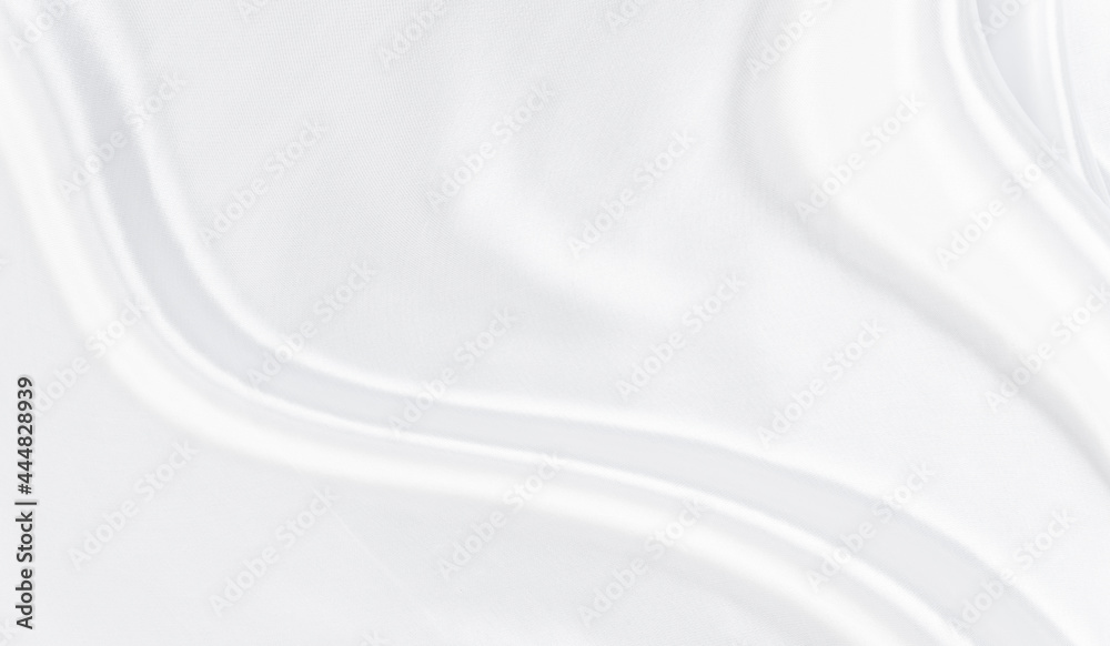 White gray satin texture that is white silver fabric silk background with beautiful soft blur pattern natural.